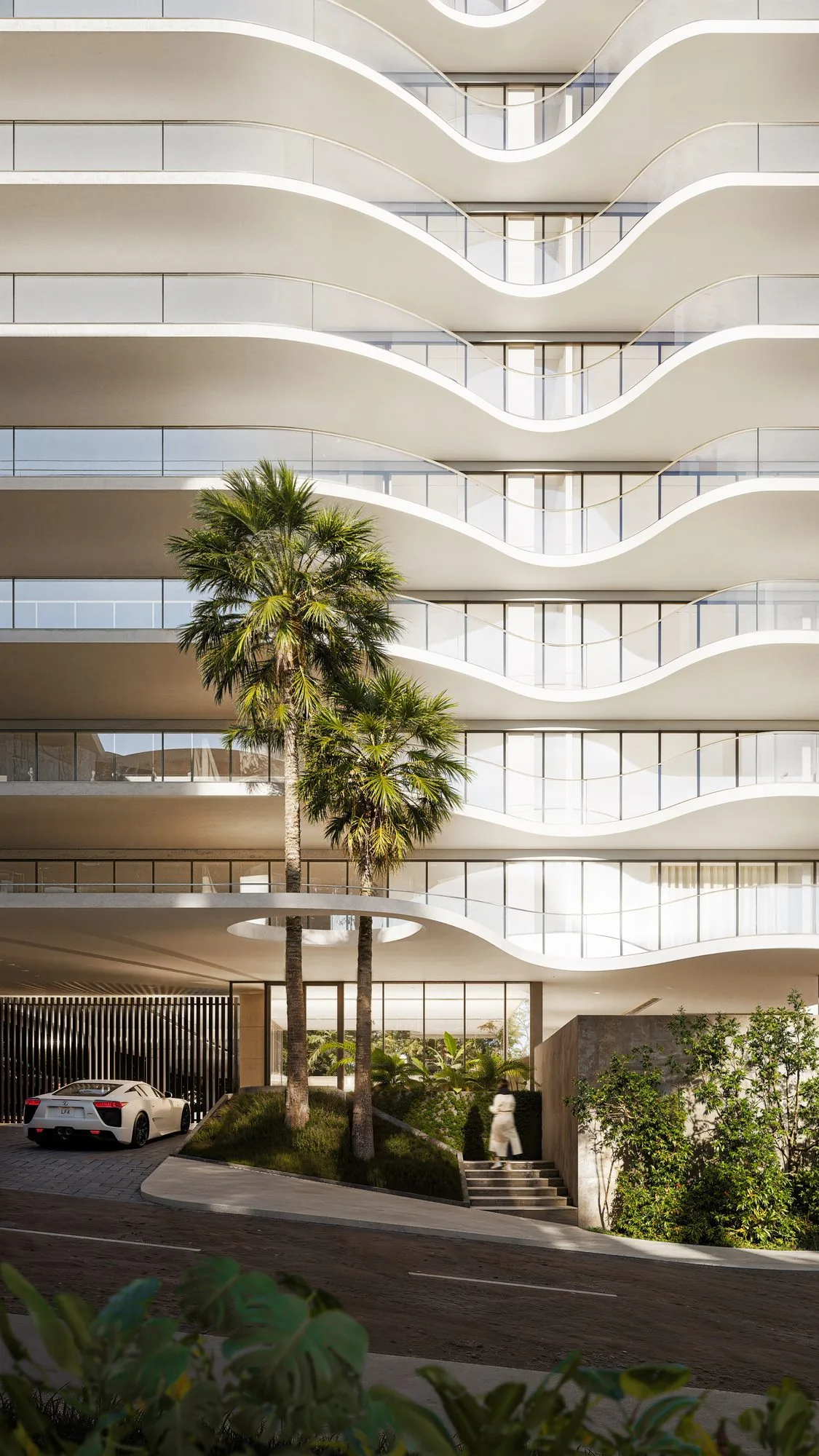 Fachada de curvas continuas con balcones, vegetación y palmas